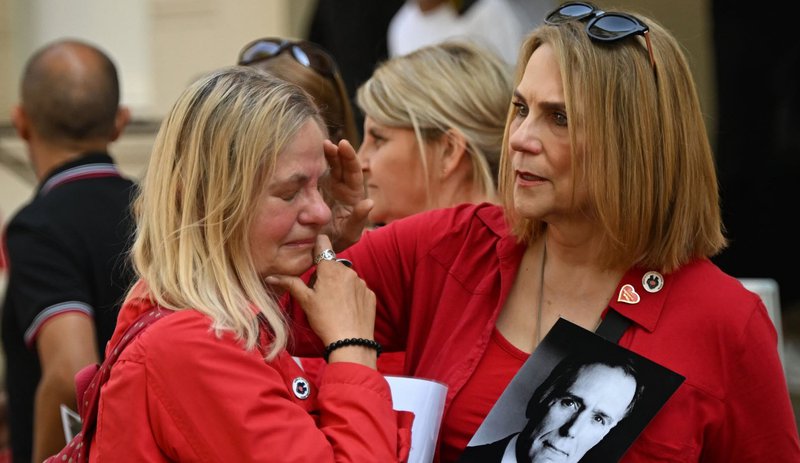 ΔΙΚΗ ΚΟΡΟΝΟΙΟΣ ΒΡΕΤΑΝΙΑ Photo by JUSTIN TALLIS AFP 2.jpg