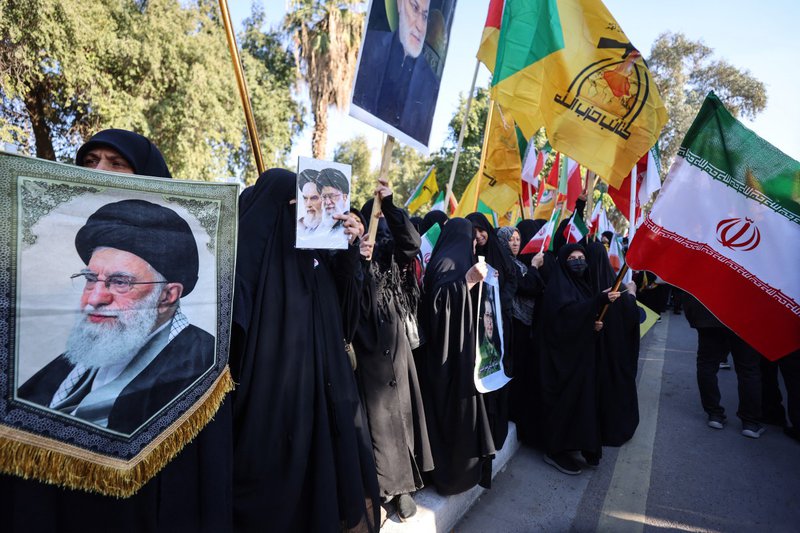 IRAN PROTESTS-Photo by AHMAD AL-RUBAYE - AFP.jpg